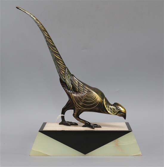 A stylish Art Deco model of a pheasant, on mixed marble height 37.5cm